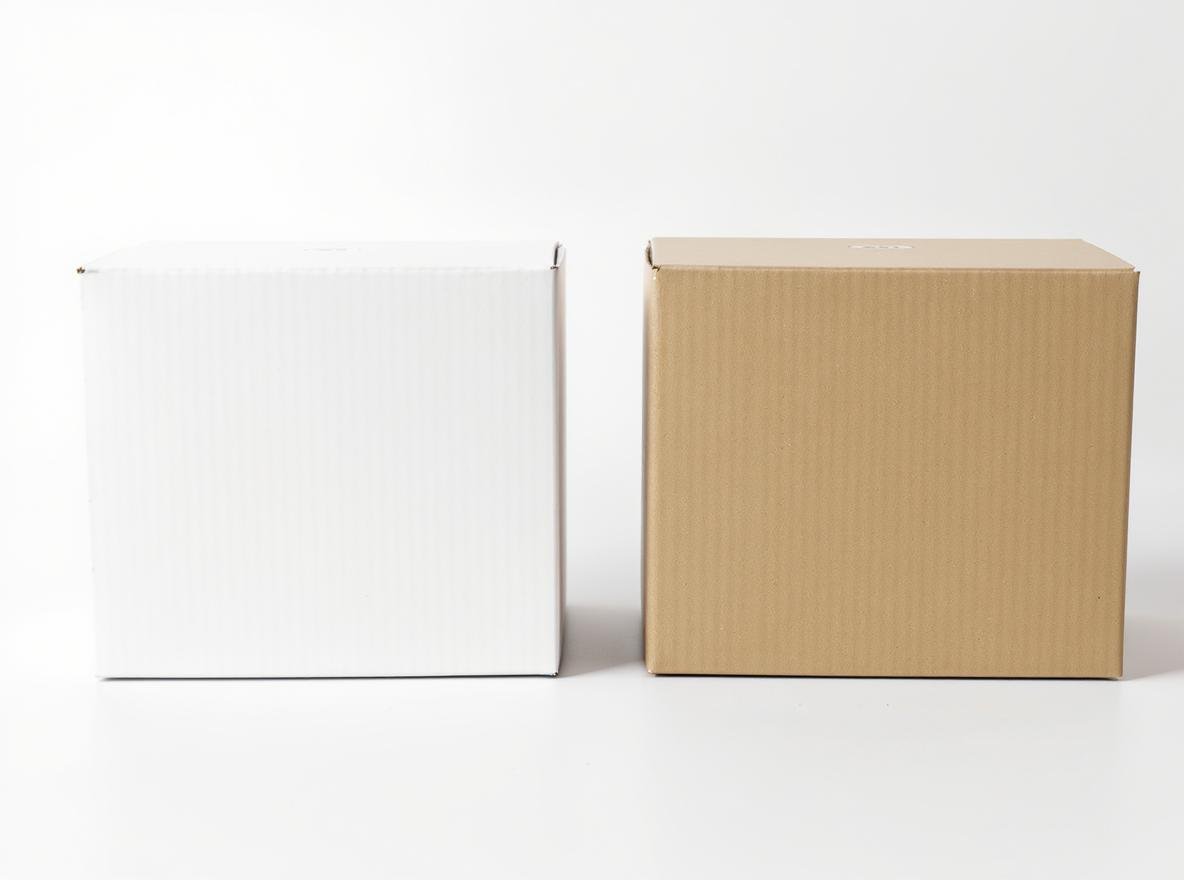 White corrugated box vs kraft brown corrugated box comparison showing material differences