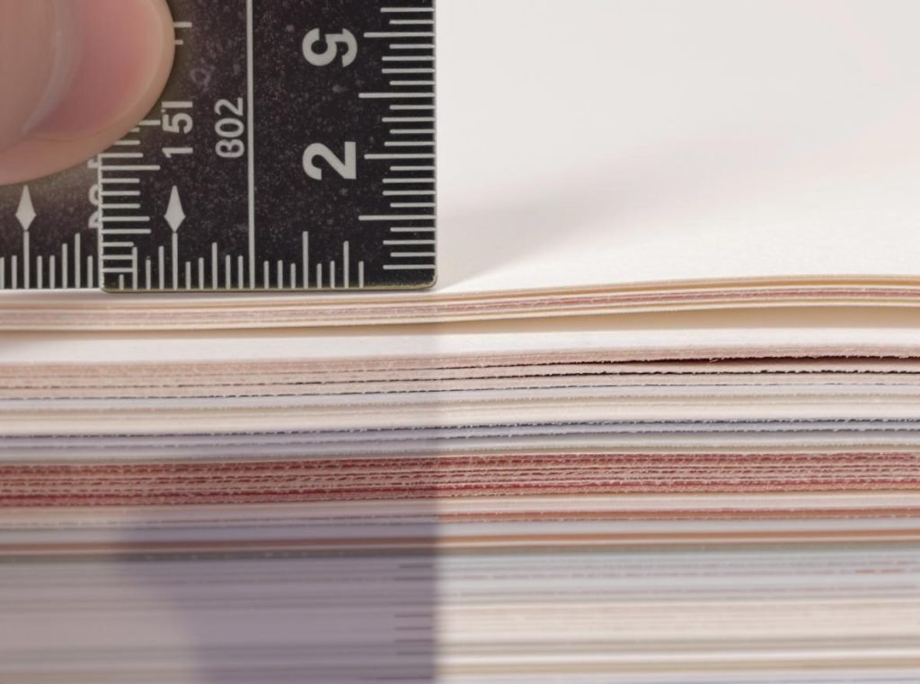 Paper thickness comparison showing different GSM weights for packaging