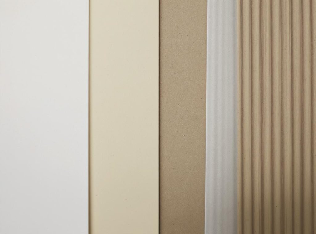 Different paper types showing how substrates affect CMYK and Pantone printing