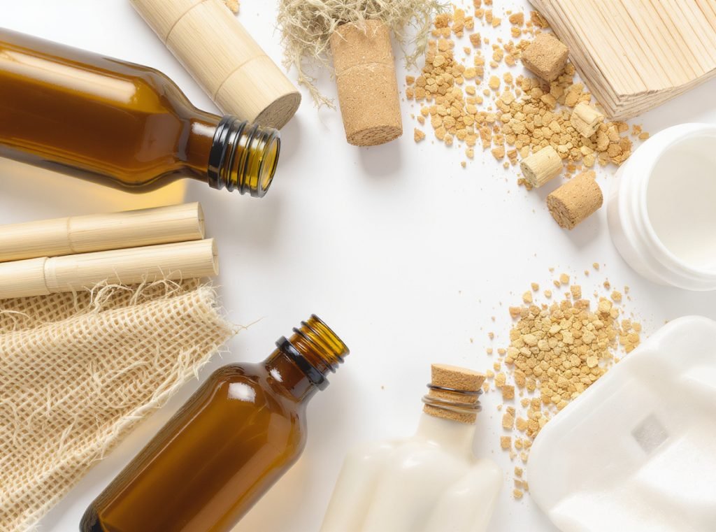 Sustainable cosmetic packaging materials comparison glass bamboo cork recycled plastic bio-plastic hemp