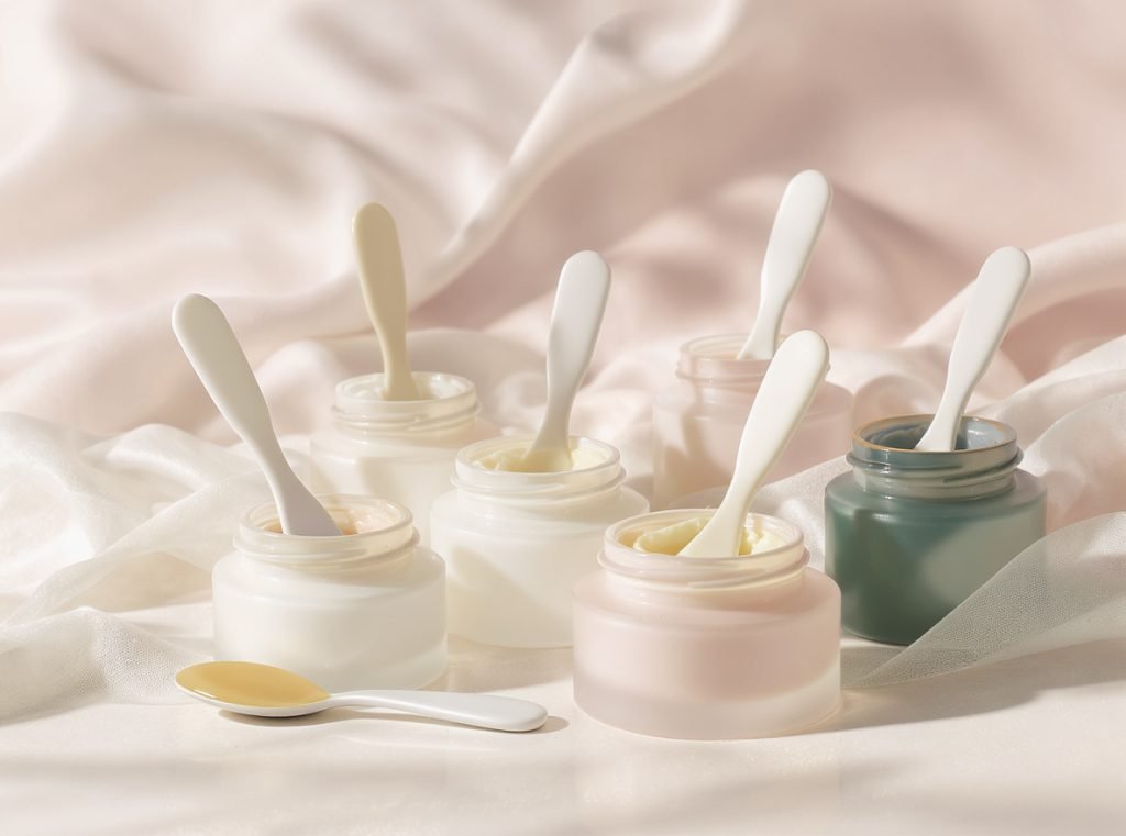 Brand design showcase of different cosmetic packaging options with integrated spatulas